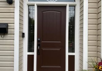chestnut brown steel door with lexington patina sidelites and 2 panel camber top